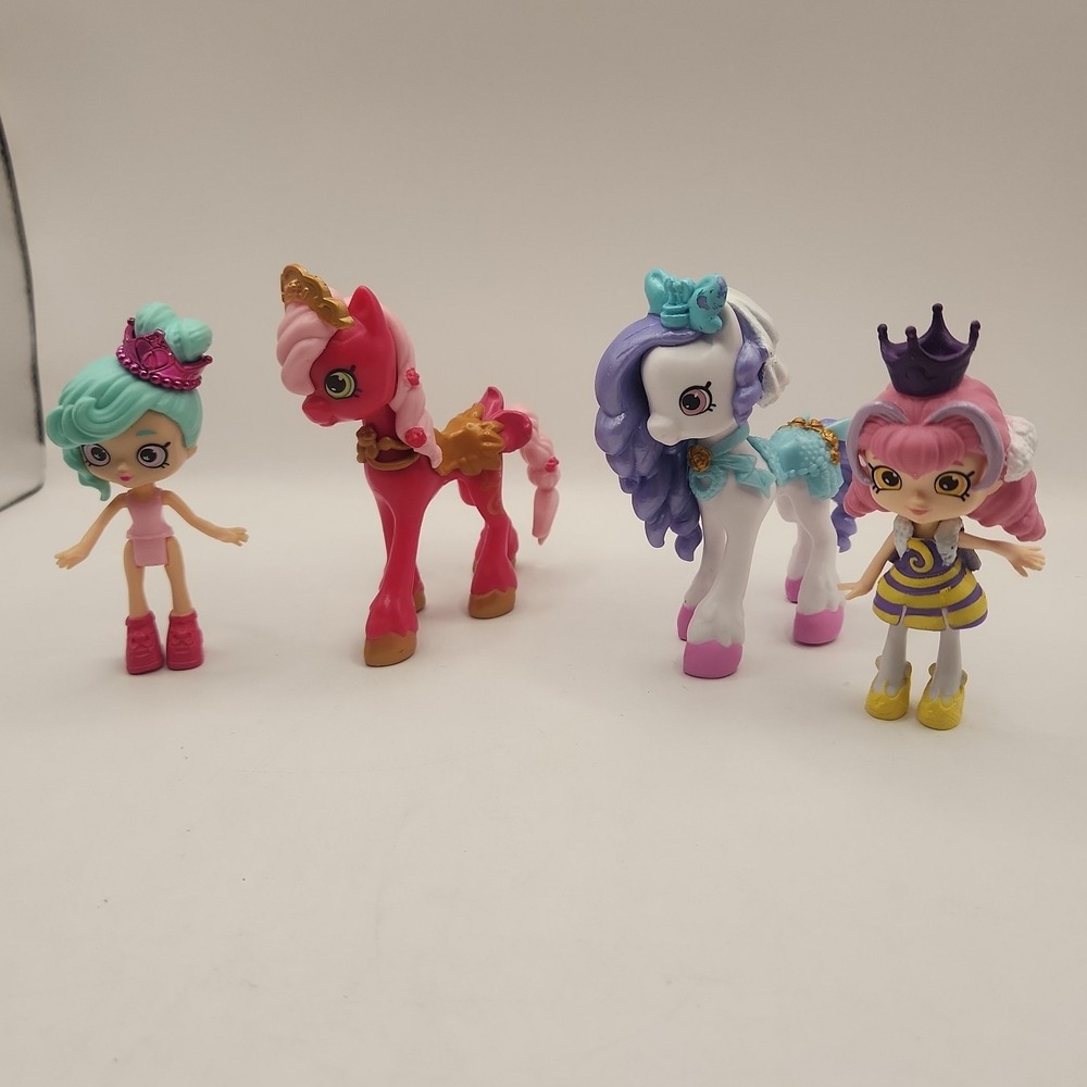 Two figures and 2 horses from Shopkins Happy Places Royal Trends line Moose Toys